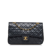 Shop safe online at Labellov in Antwerp this 100% authentic second hand CHANEL black lambskin medium Classic flap bag