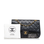 Shop safe online at Labellov in Antwerp this 100% authentic second hand CHANEL black lambskin medium Classic flap bag