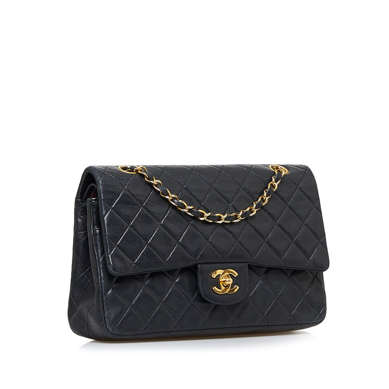 Shop safe online at Labellov in Antwerp this 100% authentic second hand CHANEL black lambskin medium Classic flap bag