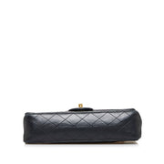 Shop safe online at Labellov in Antwerp this 100% authentic second hand CHANEL black lambskin medium Classic flap bag