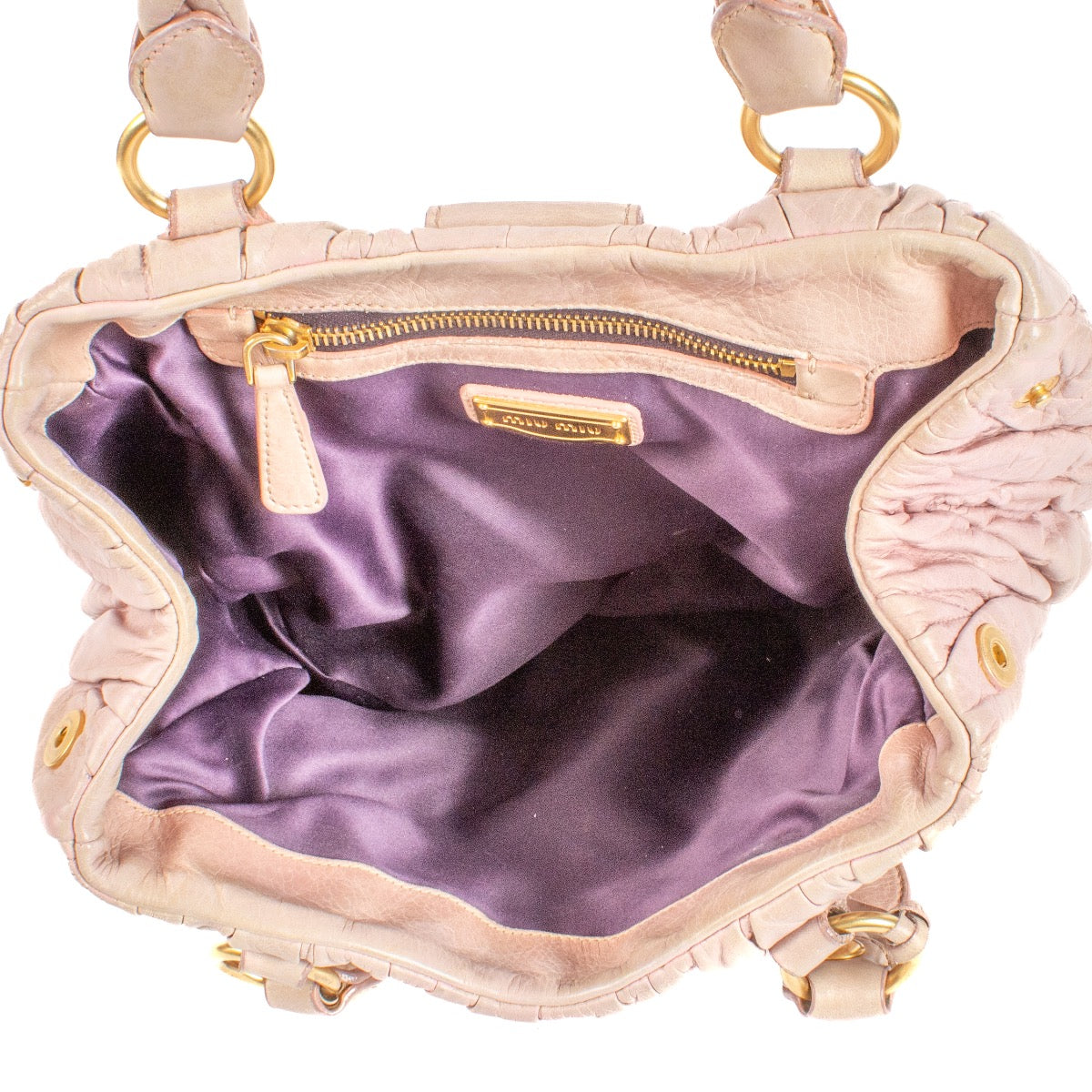Shop safe online at Labellov in Antwerp, Brussels and Knokke this 100% authentic second hand designer Miu Miu Dusty Pink Matelasse Top Handle Bag