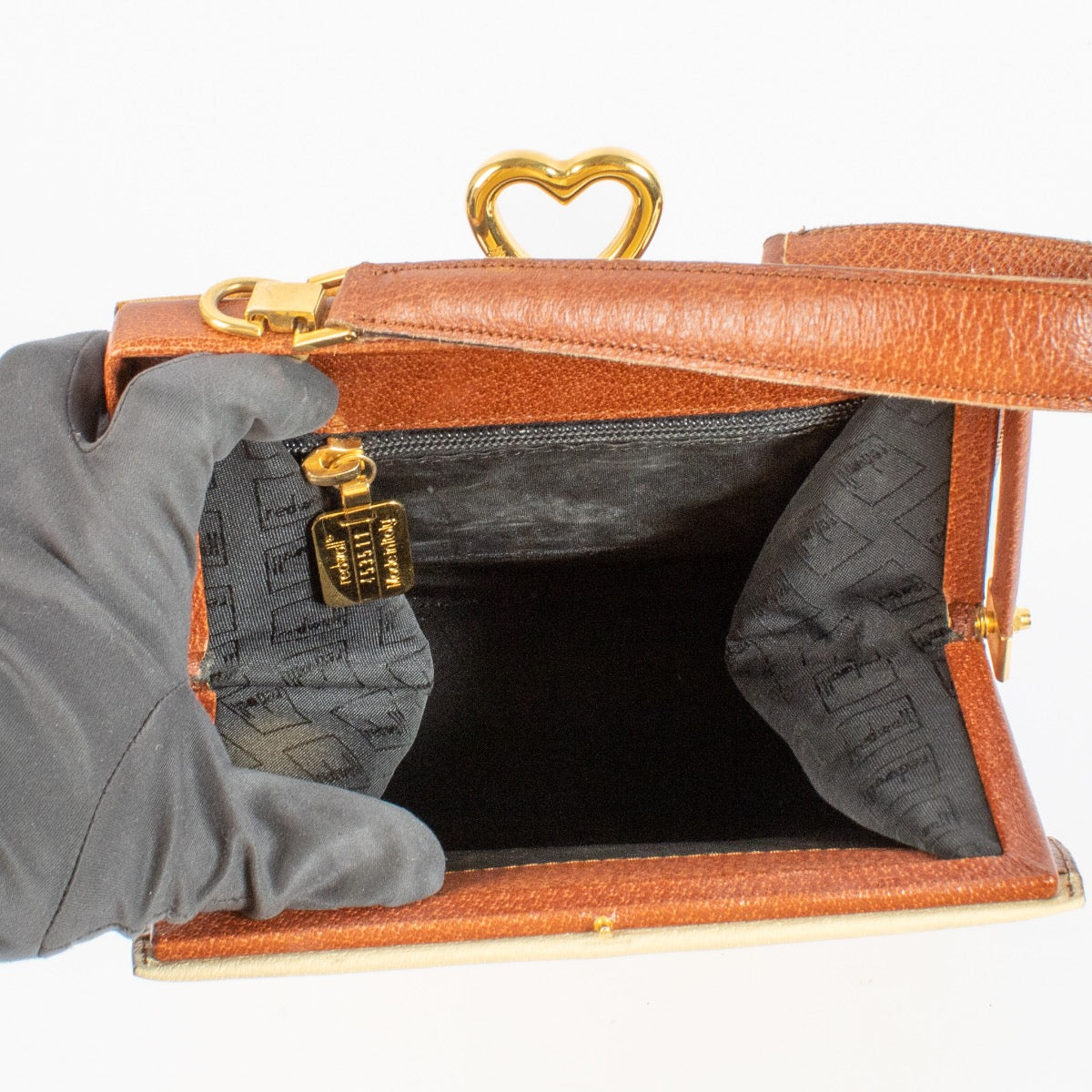 Shop 100% authentic second hand Moschino Beige Love Vintage Bag on Labellov.com
