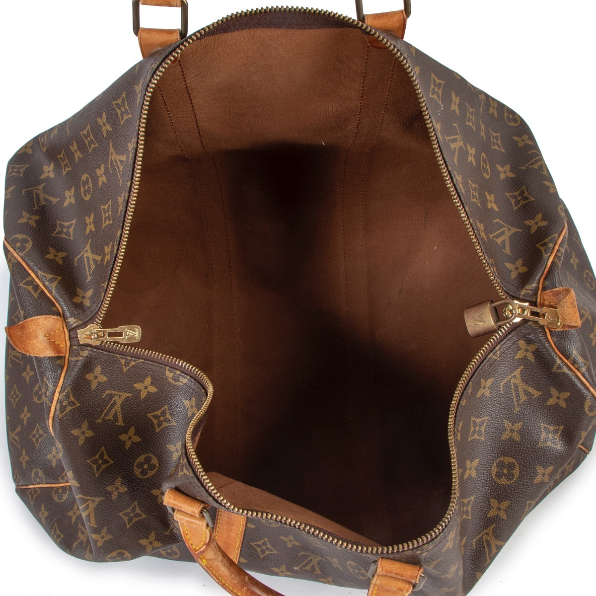 Buy an authentic second hand Louis Vuitton Keepall 55 Monogram Canvas in good pre-loved condition at Labellov