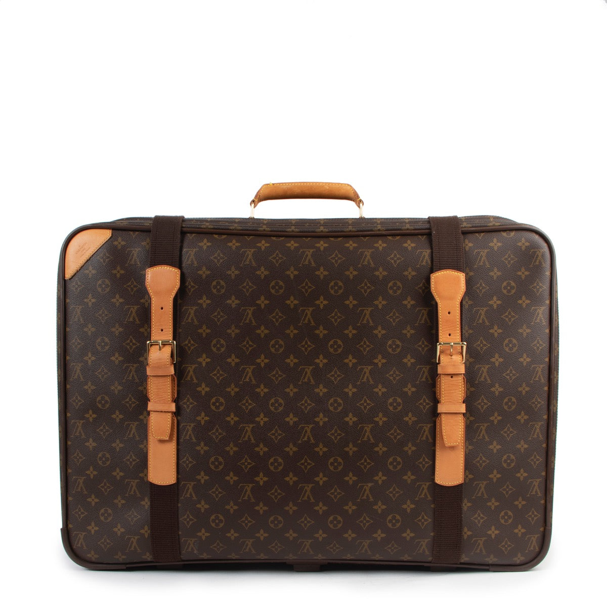 Buy online authentic second hand Louis Vuitton Monogram Satalitte 70 Travel Bag in very good condition at Labellov in Antwerp