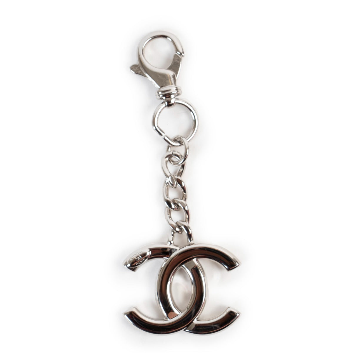 Shop authentic second hand luxury high-end designer vintage Chanel Silver CC Logo Keychain Bag Charm at Labellov.