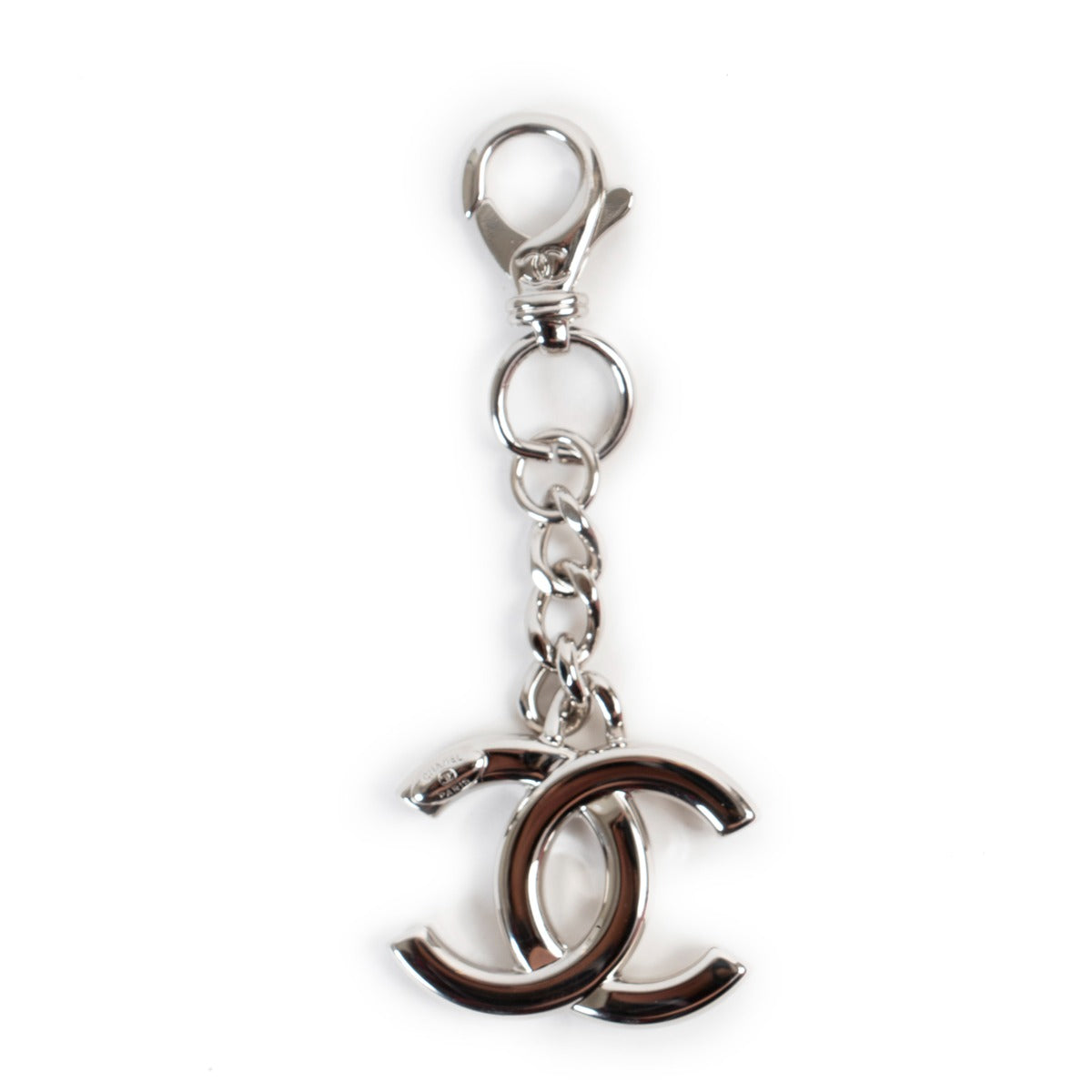 Shop authentic second hand luxury high-end designer vintage Chanel Silver CC Logo Keychain Bag Charm at Labellov.