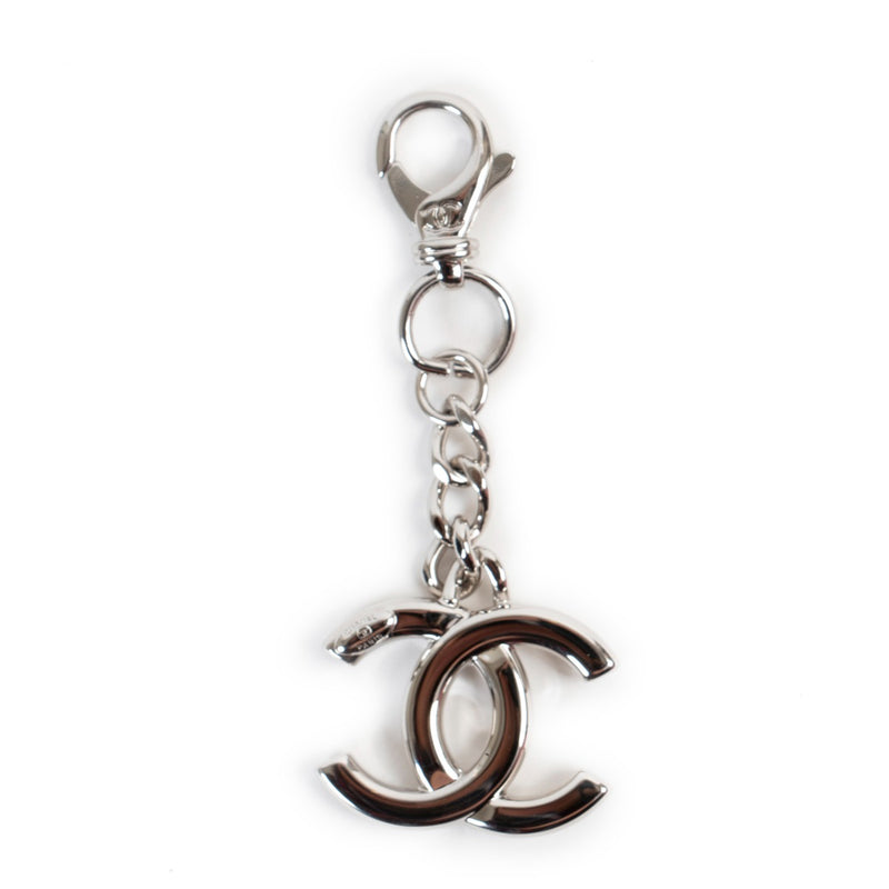 Shop authentic second hand luxury high-end designer vintage Chanel Silver CC Logo Keychain Bag Charm at Labellov.