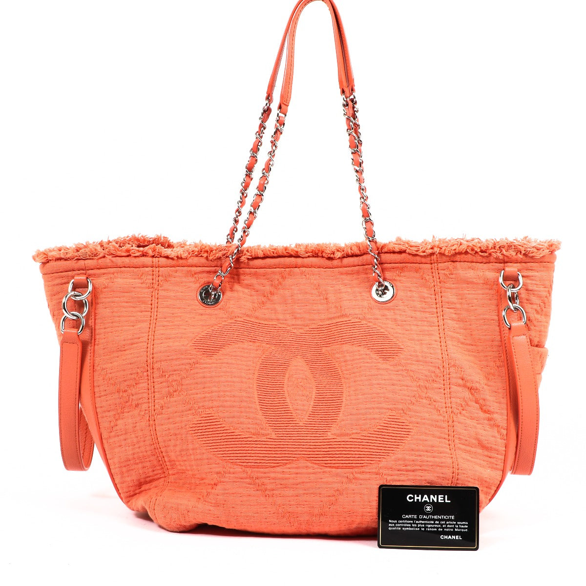 Buy an authentic second-hand Chanel Orange Fabric Tote Bag in very good condition at Labellov in Antwerp.