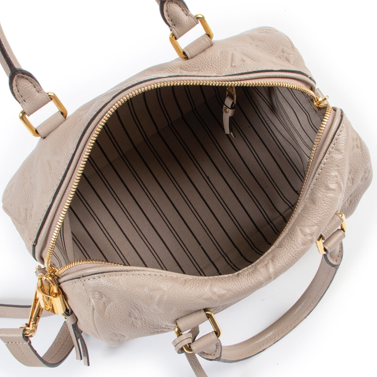 Shop safe online at Labellov in Antwerp this 100% authentic Louis Vuitton Beige Speedy 25 Bandouliere Monogram Empreinte in good condition.