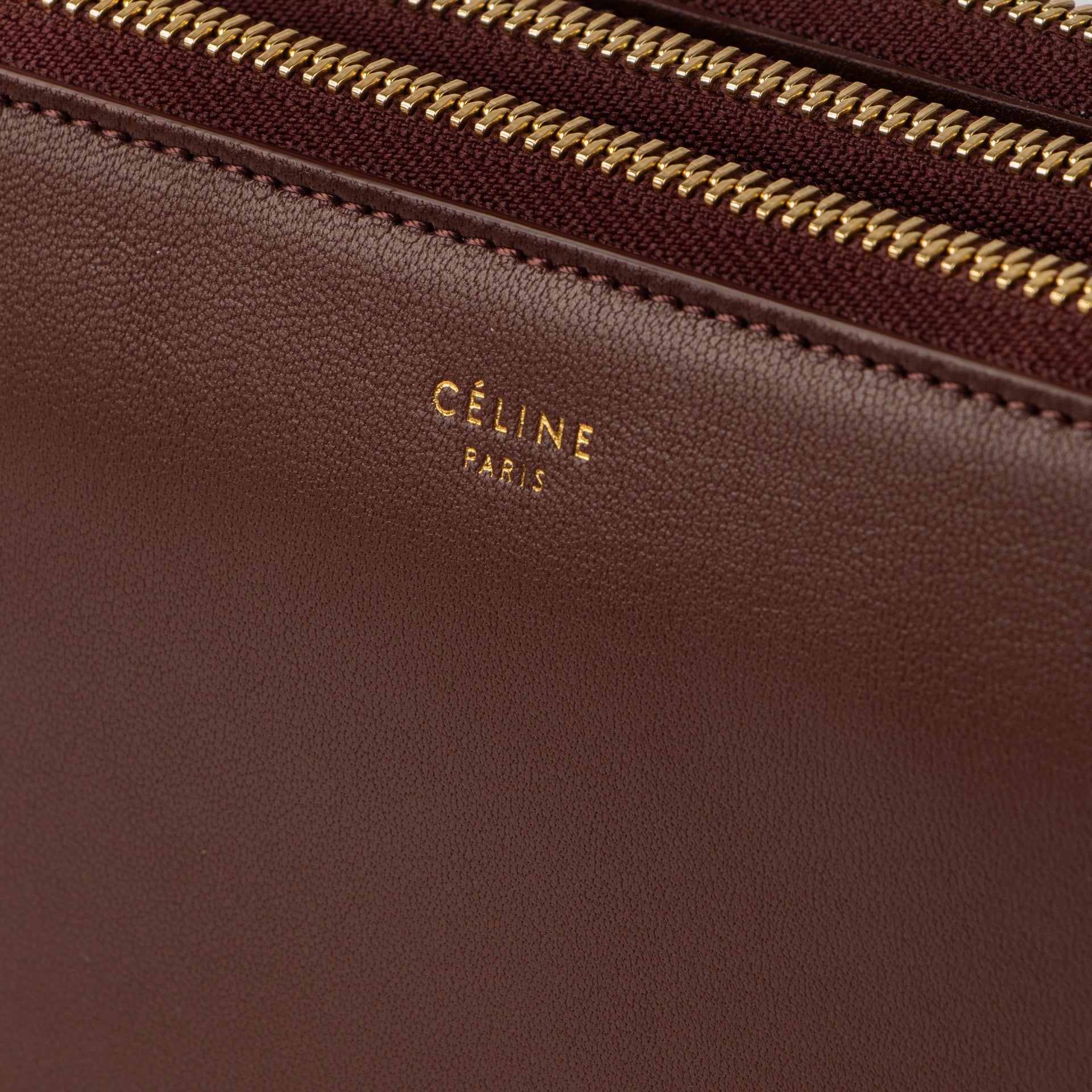 Shop this authentic Celine Burgundy Leather Large Trio Bag pre-loved on Labellov.com