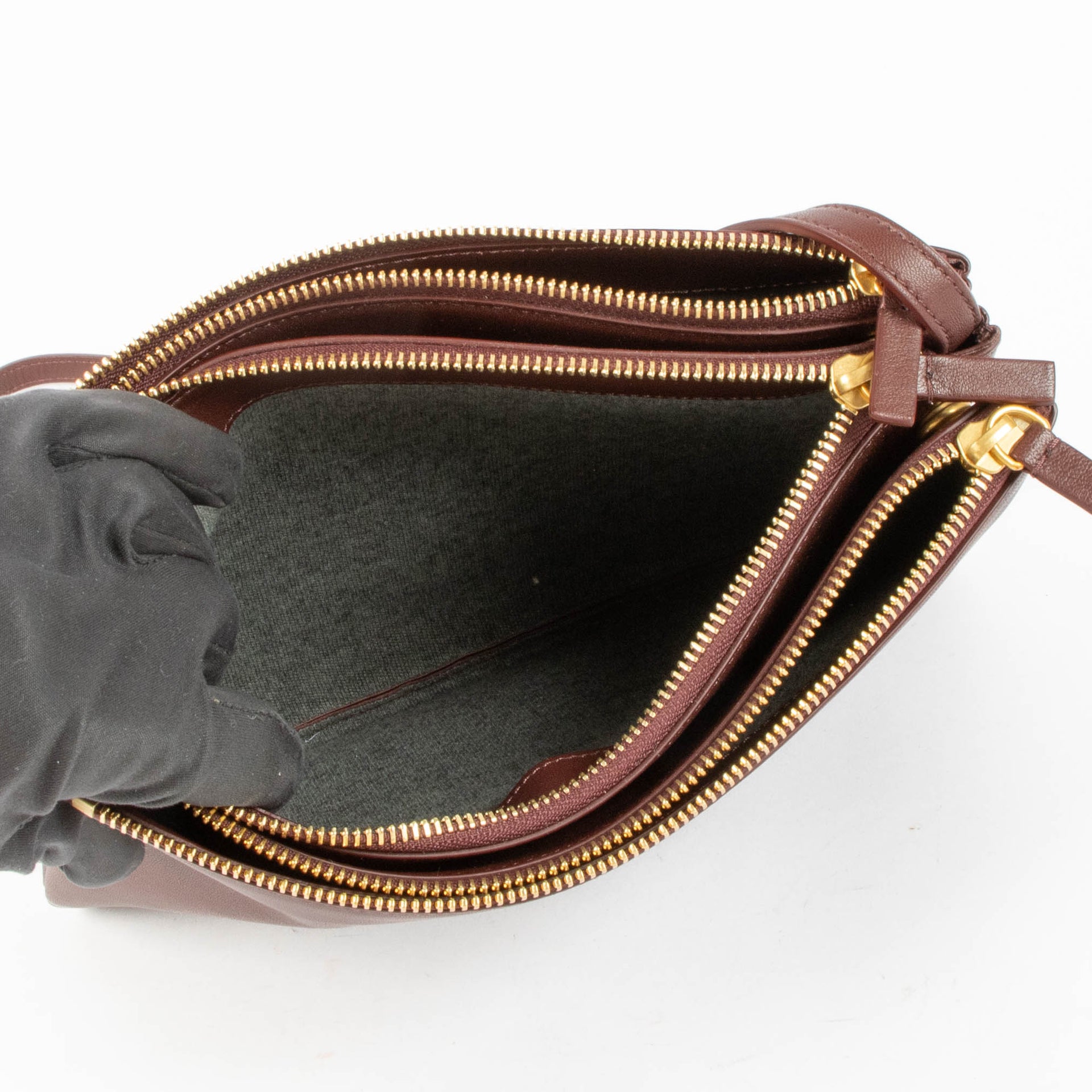 Shop this authentic Celine Burgundy Leather Large Trio Bag pre-loved on Labellov.com