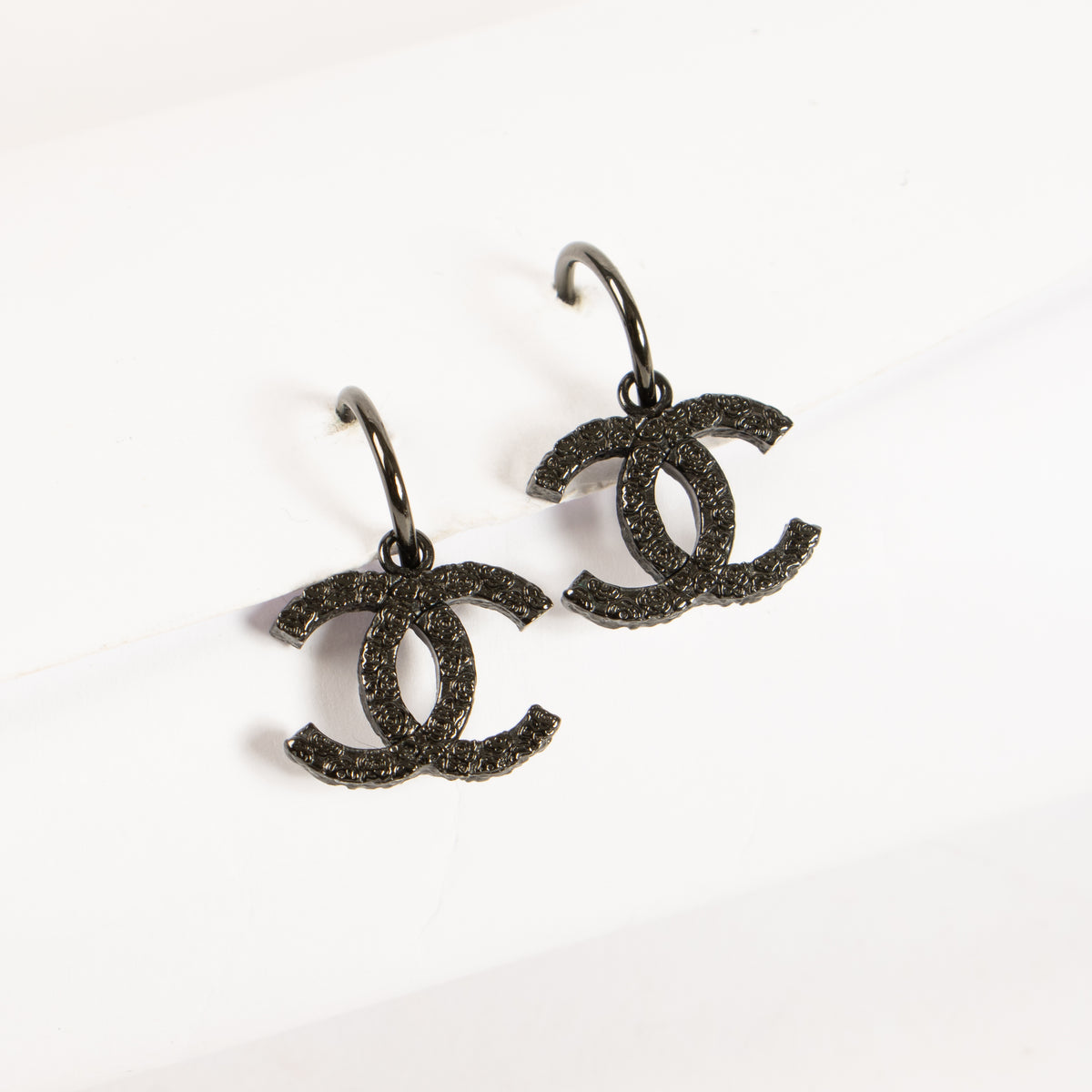 Shop this authentic Chanel 11P Black CC Earrings pre-loved on Labellov.com