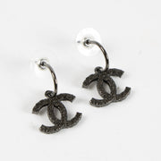 Shop this authentic Chanel 11P Black CC Earrings pre-loved on Labellov.com