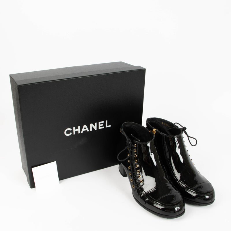 Shop this authentic Chanel 15A Black Patent Ankle Boots Size 38.5 pre-loved on Labellov.com