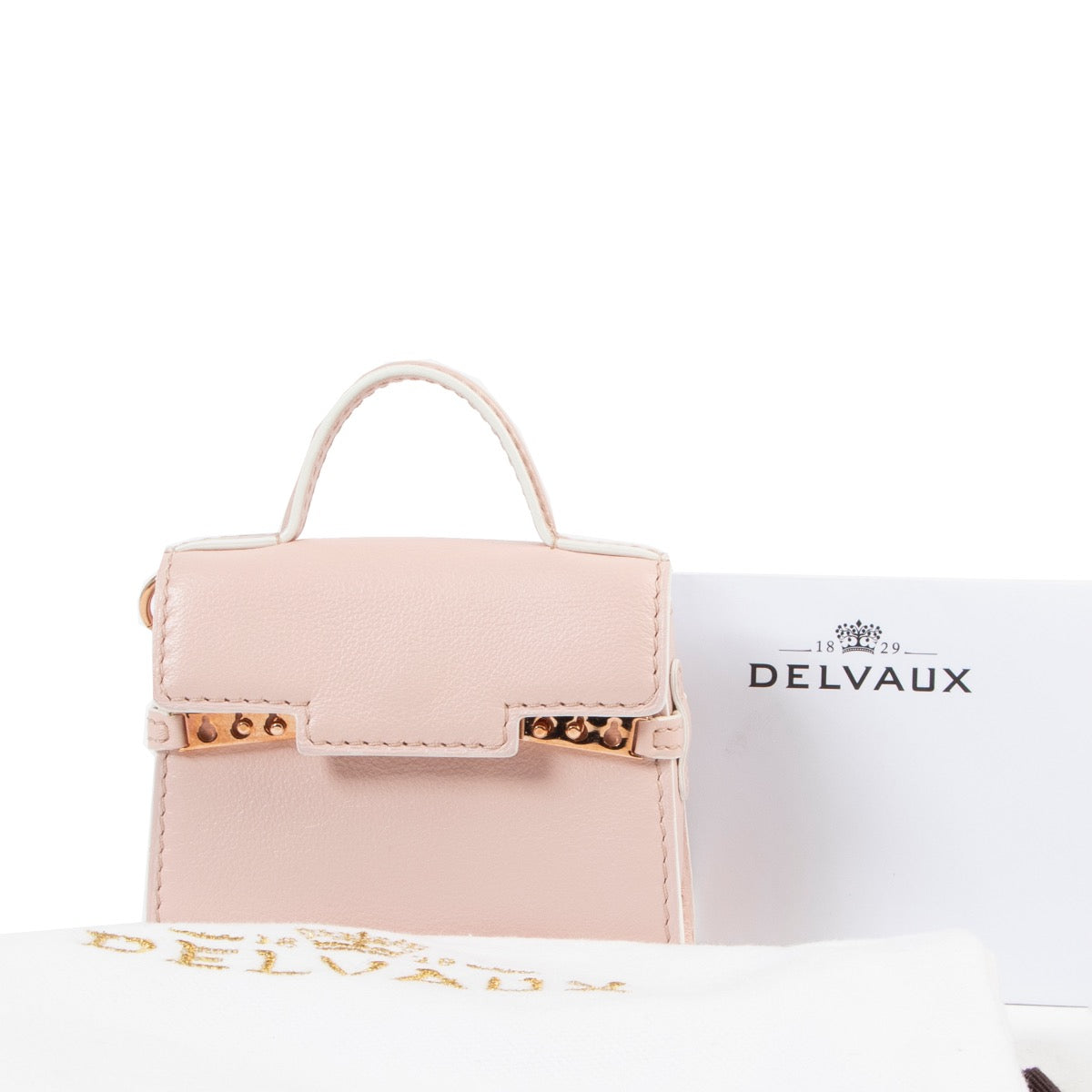 Veilig online kopen van authentieke Delvaux nude Tempête sleutelhanger.