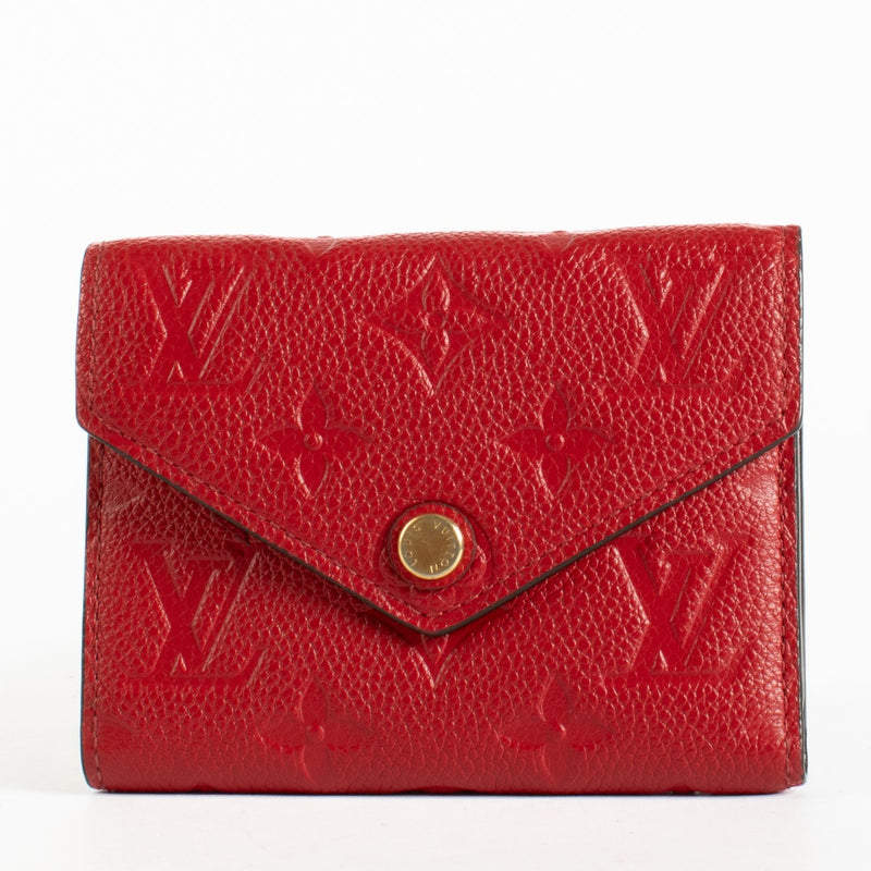 Authentic pre-loved Louis Vuitton Red Monogram Empreinte Victorine Wallet on Labellov.com