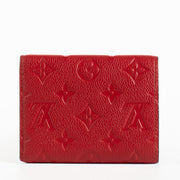 Authentic pre-loved Louis Vuitton Red Monogram Empreinte Victorine Wallet on Labellov.com