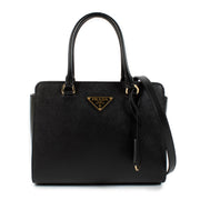 Shop safe online at Labellov in Antwerp, Brussels and Knokke this 100% authentic second hand Prada Saffiano/Soft Calf handbag. Veilig online tweedehands authentieke Prada Saffiano/Soft Calf handtas kopen bij Labellov.