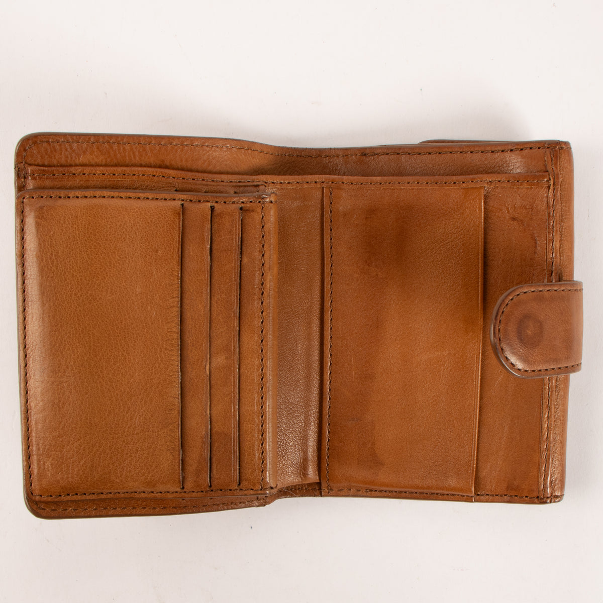 Shop this authentic Celine Cognac Wallet Pre-Loved on Labellov.com