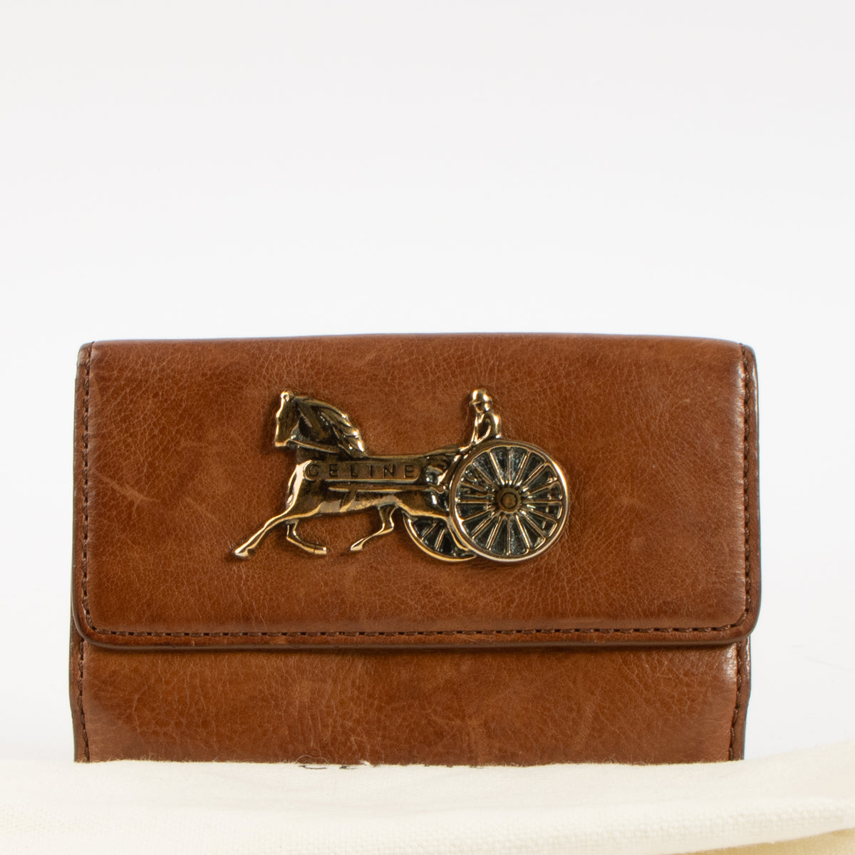 Shop this authentic Celine Cognac Wallet Pre-Loved on Labellov.com