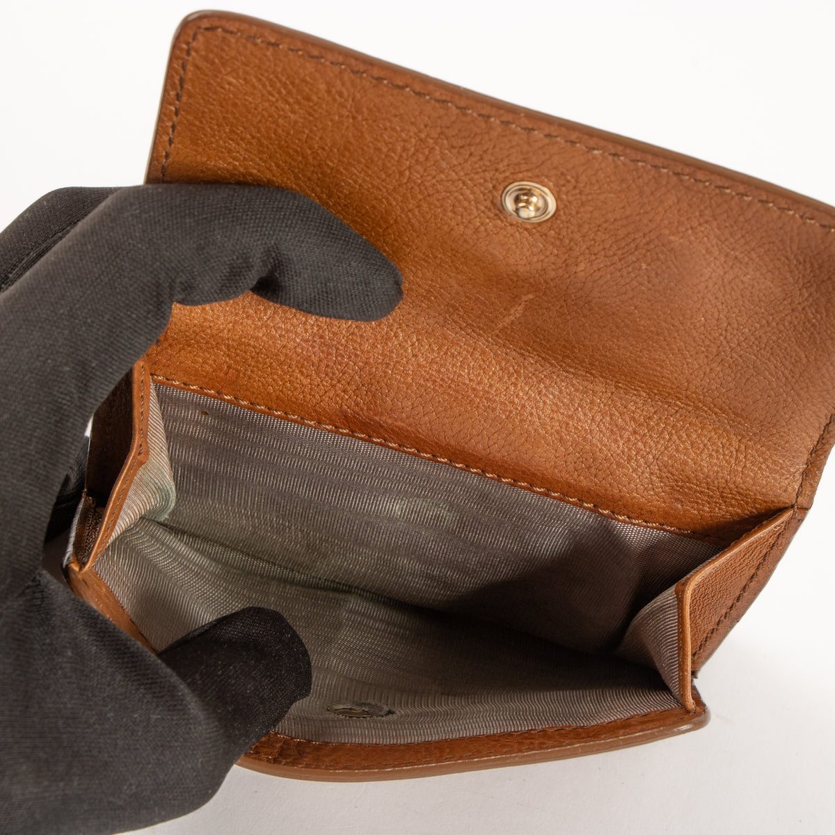 Shop this authentic Celine Cognac Wallet Pre-Loved on Labellov.com