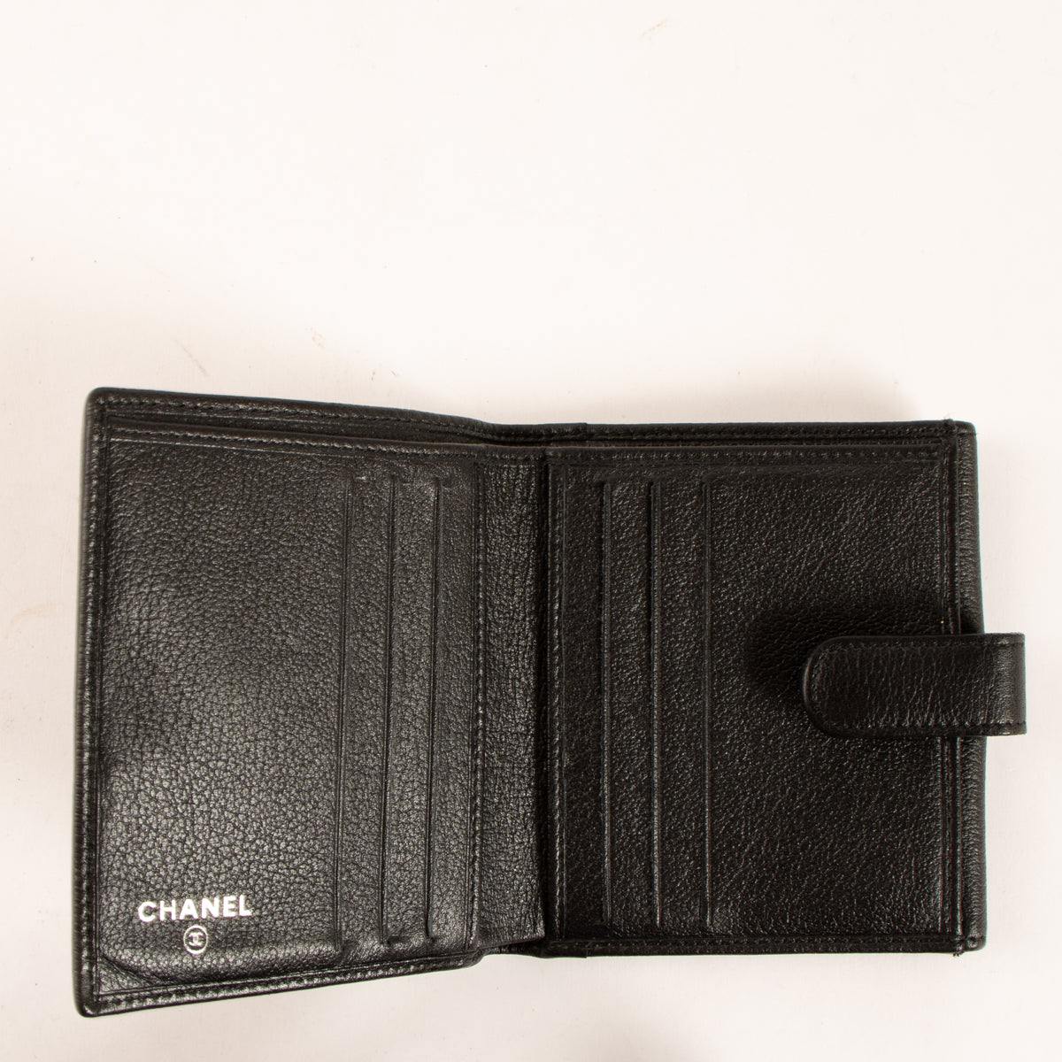 Shop this authentic Chanel Black Camelia Wallet pre-loved on Labellov.com