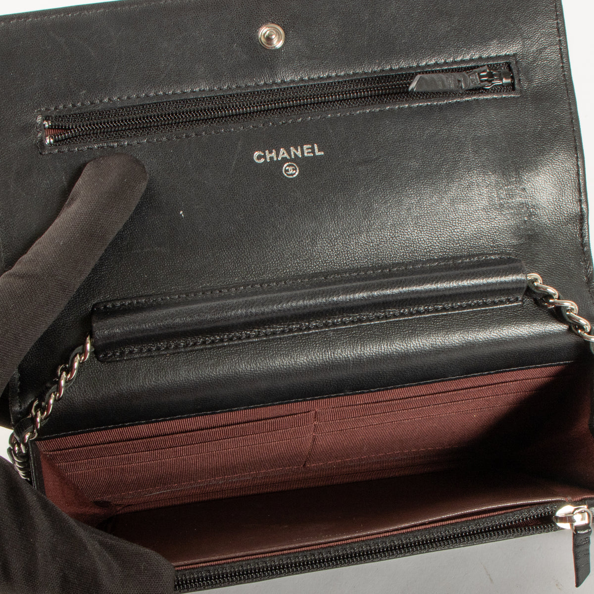 Shop this authentic Chanel Black WOC Wallet on Chain Bag Pre-Loved on Labellov.com
