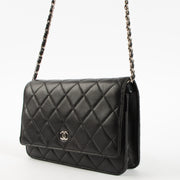 Shop this authentic Chanel Black WOC Wallet on Chain Bag Pre-Loved on Labellov.com