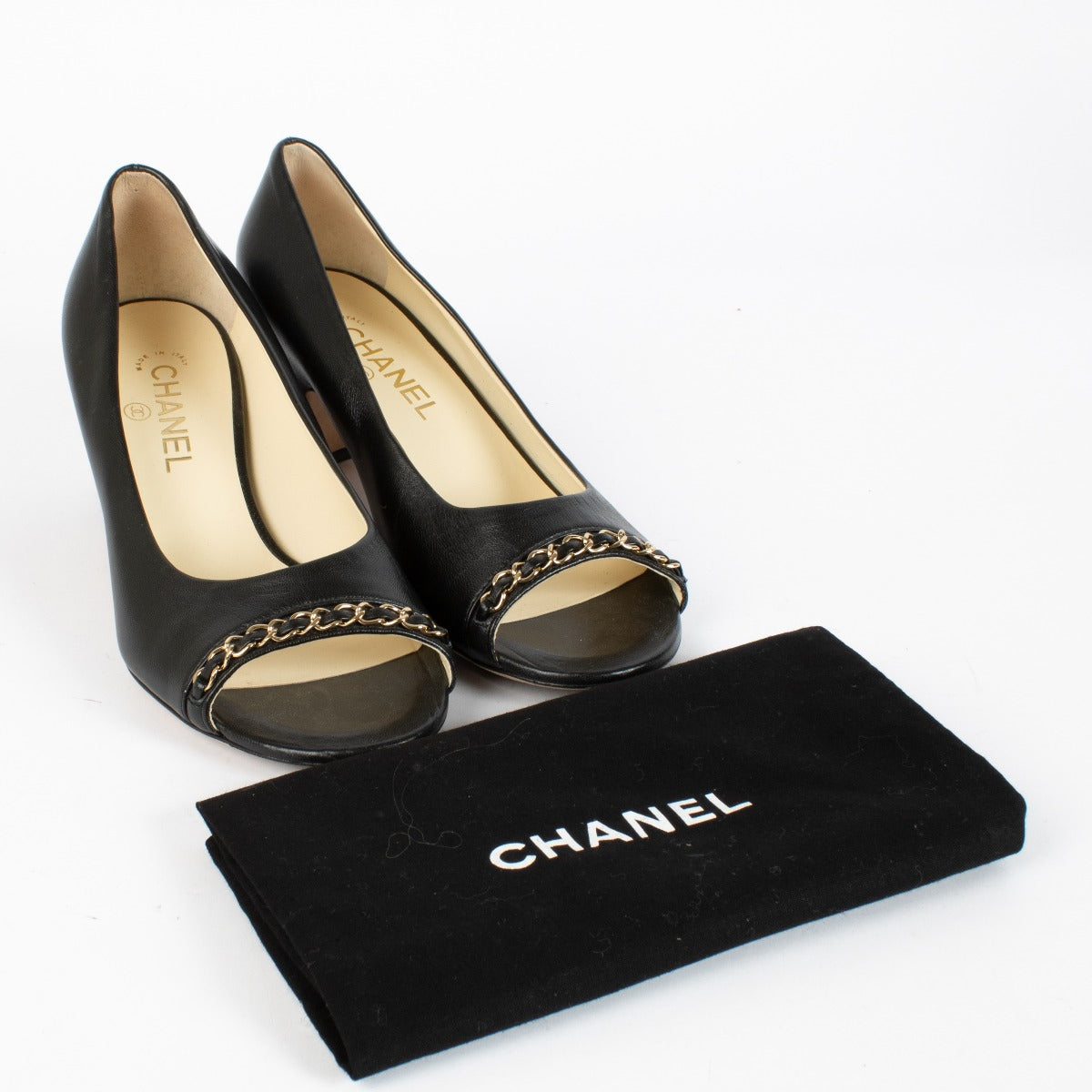 Authentic pre-loved Chanel Black Lambskin Chain Trim Peep Toe Block Heels — Size 39.5 on Labellov.com