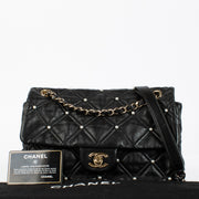 Shop the authentic Chanel Black Quilted Lambskin Pearl Flap Bag at Labellov.com.