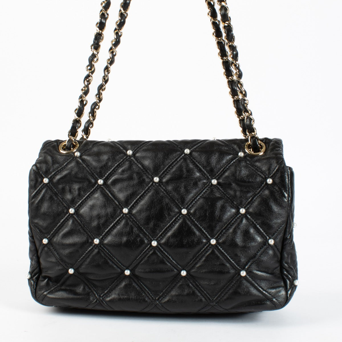 Shop the authentic Chanel Black Quilted Lambskin Pearl Flap Bag at Labellov.com.