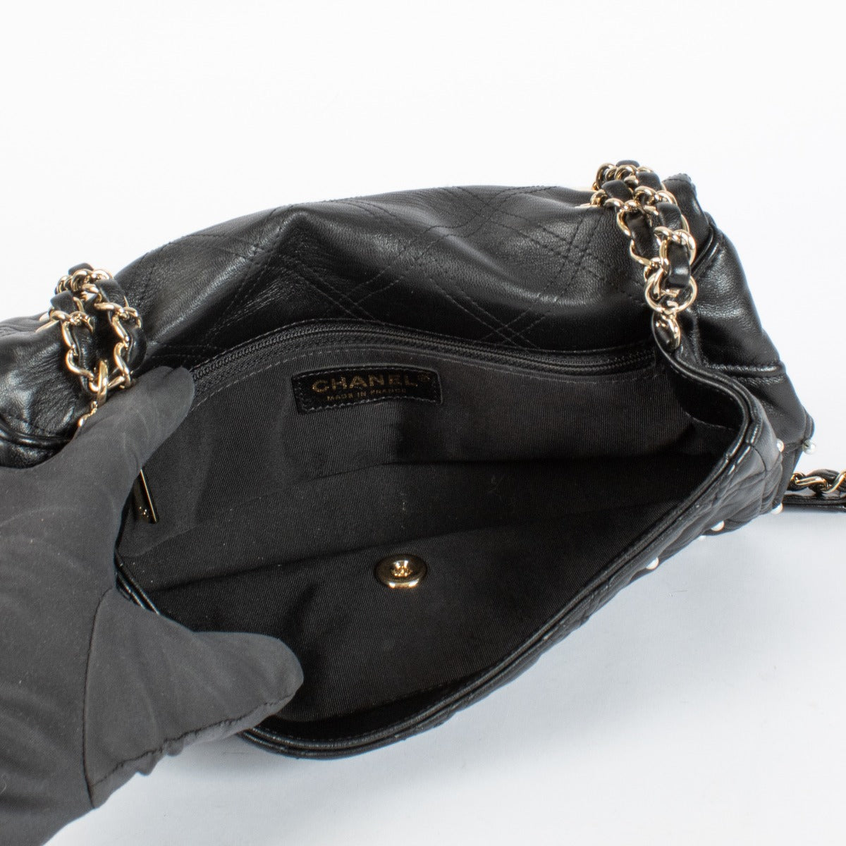 Shop the authentic Chanel Black Quilted Lambskin Pearl Flap Bag at Labellov.com.