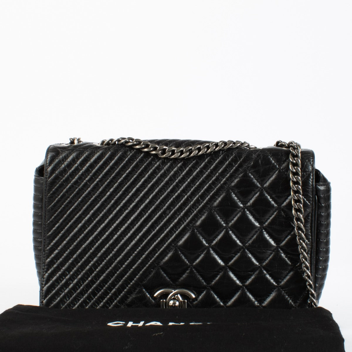Shop the authentic Chanel Coco Boy Medium Quilted Glazed Calfskin Flap Bag in Noir with ruthenium hardware at Labellov.com.