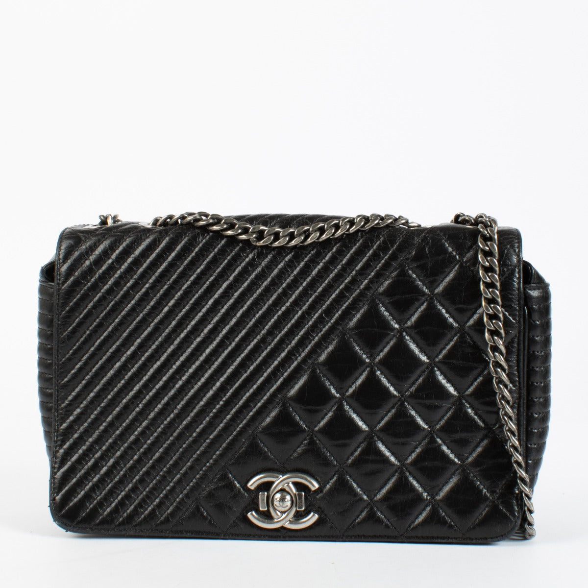 Shop the authentic Chanel Coco Boy Medium Quilted Glazed Calfskin Flap Bag in Noir with ruthenium hardware at Labellov.com.