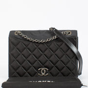 Chanel Black Quilted Satin Ballerine Flap Bag with silver chain strap and CC logo clasp at Labellov.com