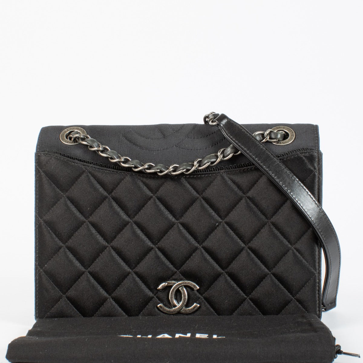 Chanel Black Quilted Satin Ballerine Flap Bag with silver chain strap and CC logo clasp at Labellov.com
