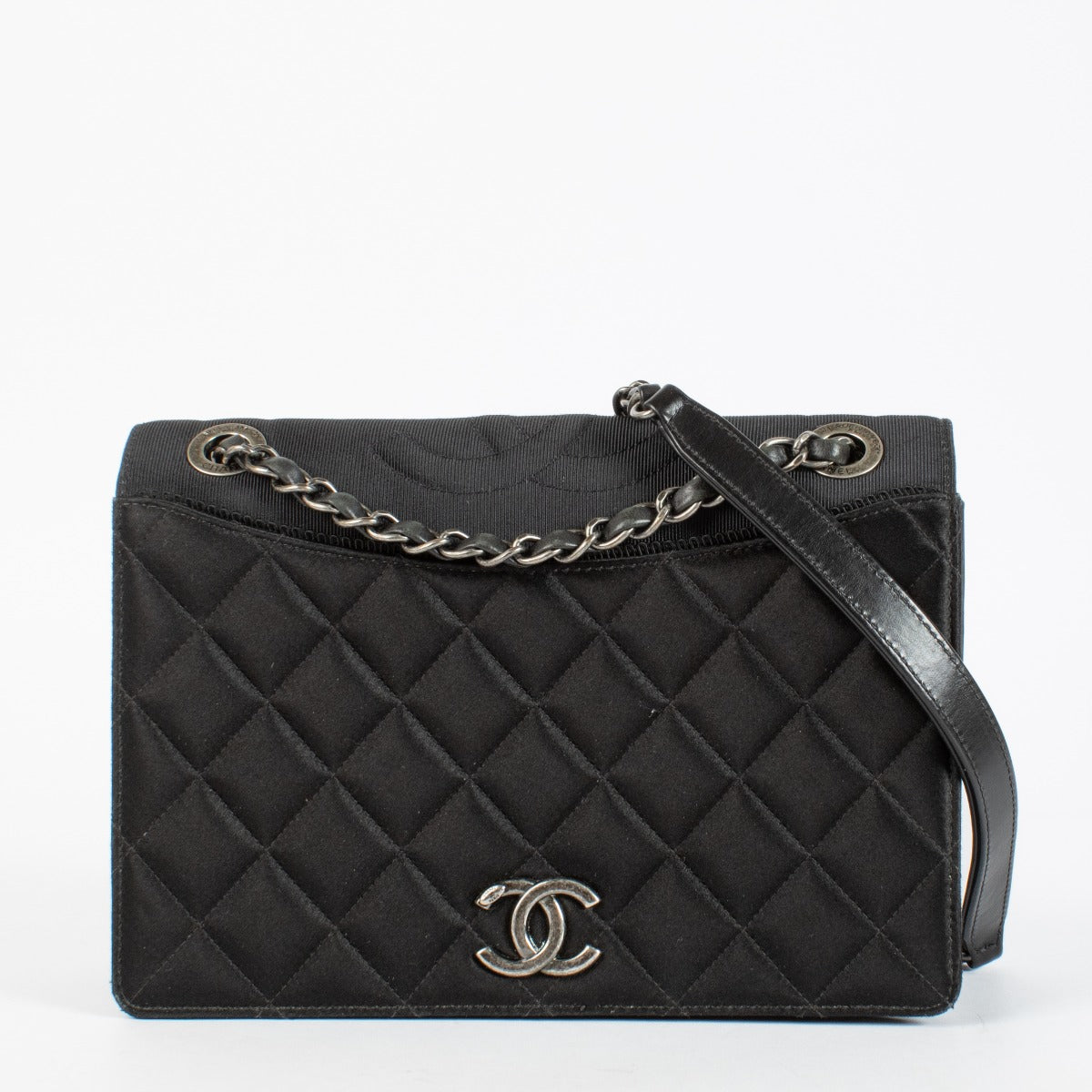 Chanel Black Quilted Satin Ballerine Flap Bag with silver chain strap and CC logo clasp at Labellov.com