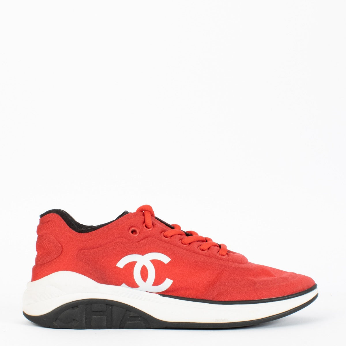 Authentic pre-loved Chanel Red Ankle Strap Cloth Sneakers — Size 39.5 on Labellov.com