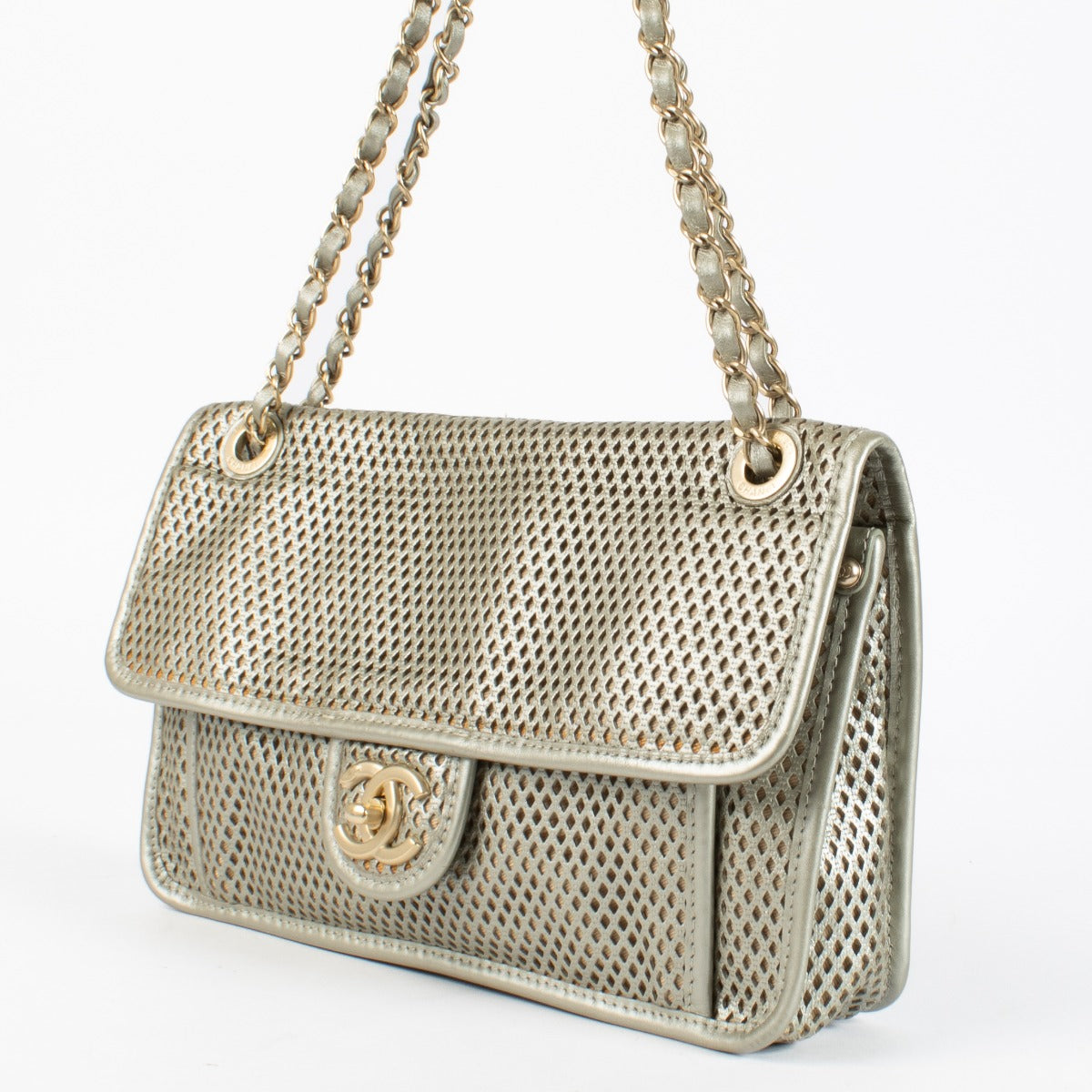Chanel Silver Perforated Flap Bag with gold CC clasp and chain strap at Labellov.com
