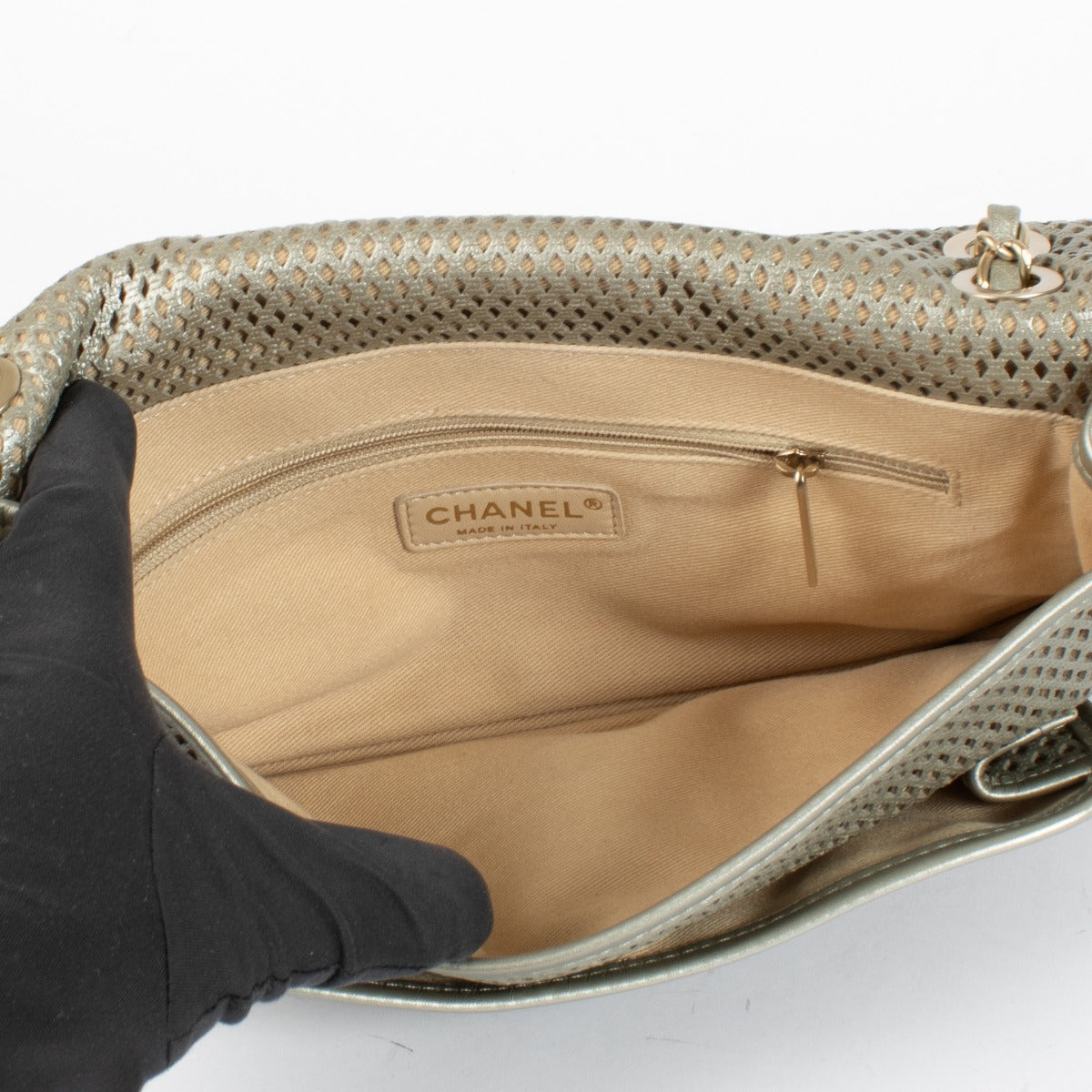 Chanel Silver Perforated Flap Bag with gold CC clasp and chain strap at Labellov.com