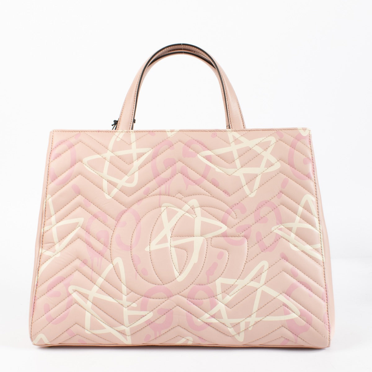 Shop the authentic Gucci GG Marmont Graffiti Matelassé Tote in pink leather at Labellov.com.