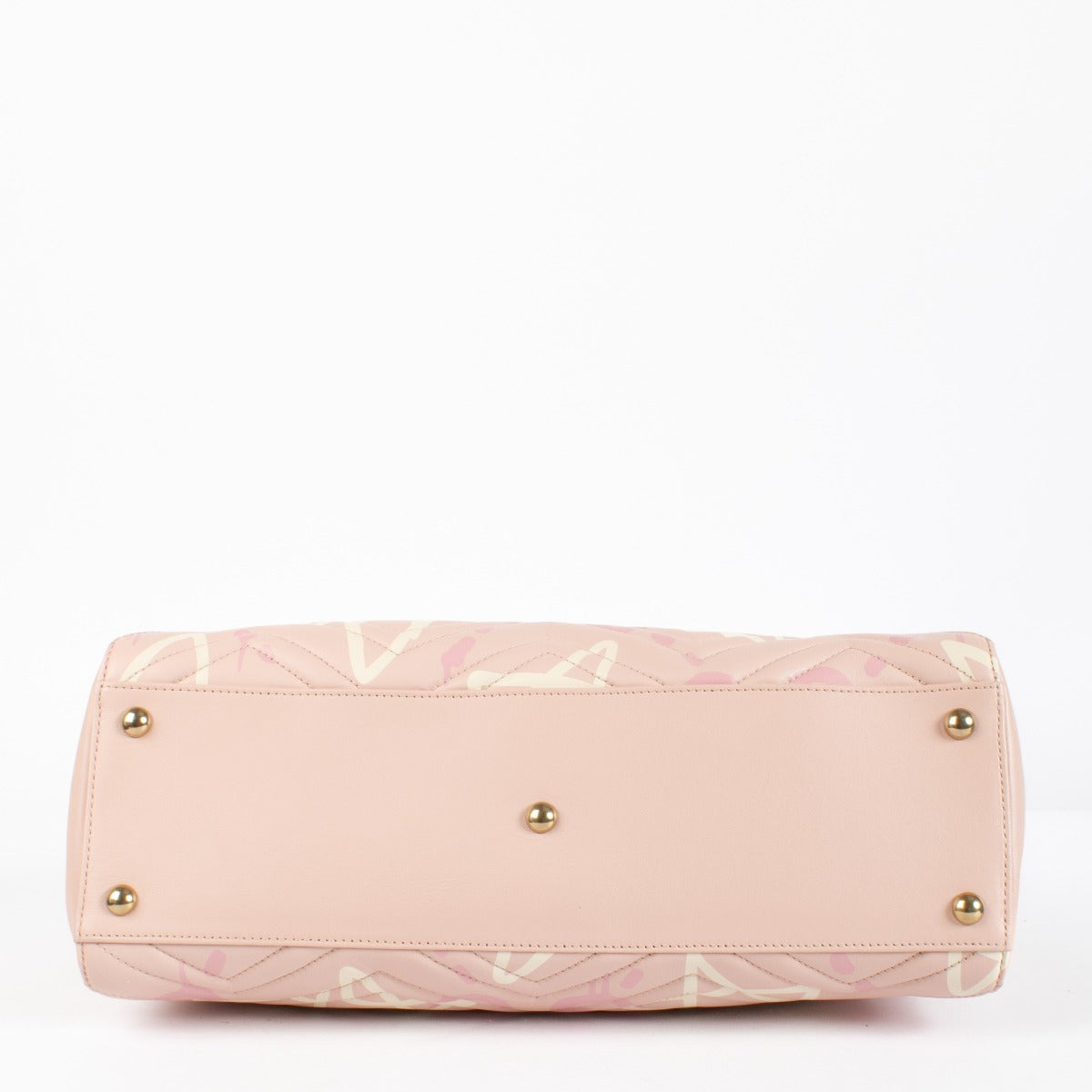 Shop the authentic Gucci GG Marmont Graffiti Matelassé Tote in pink leather at Labellov.com.