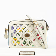 Authentic preloved Gucci White Cutout Leather Floral Canvas Bag on Labellov.com