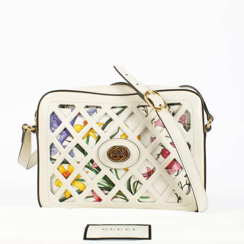 Authentic preloved Gucci White Cutout Leather Floral Canvas Bag on Labellov.com