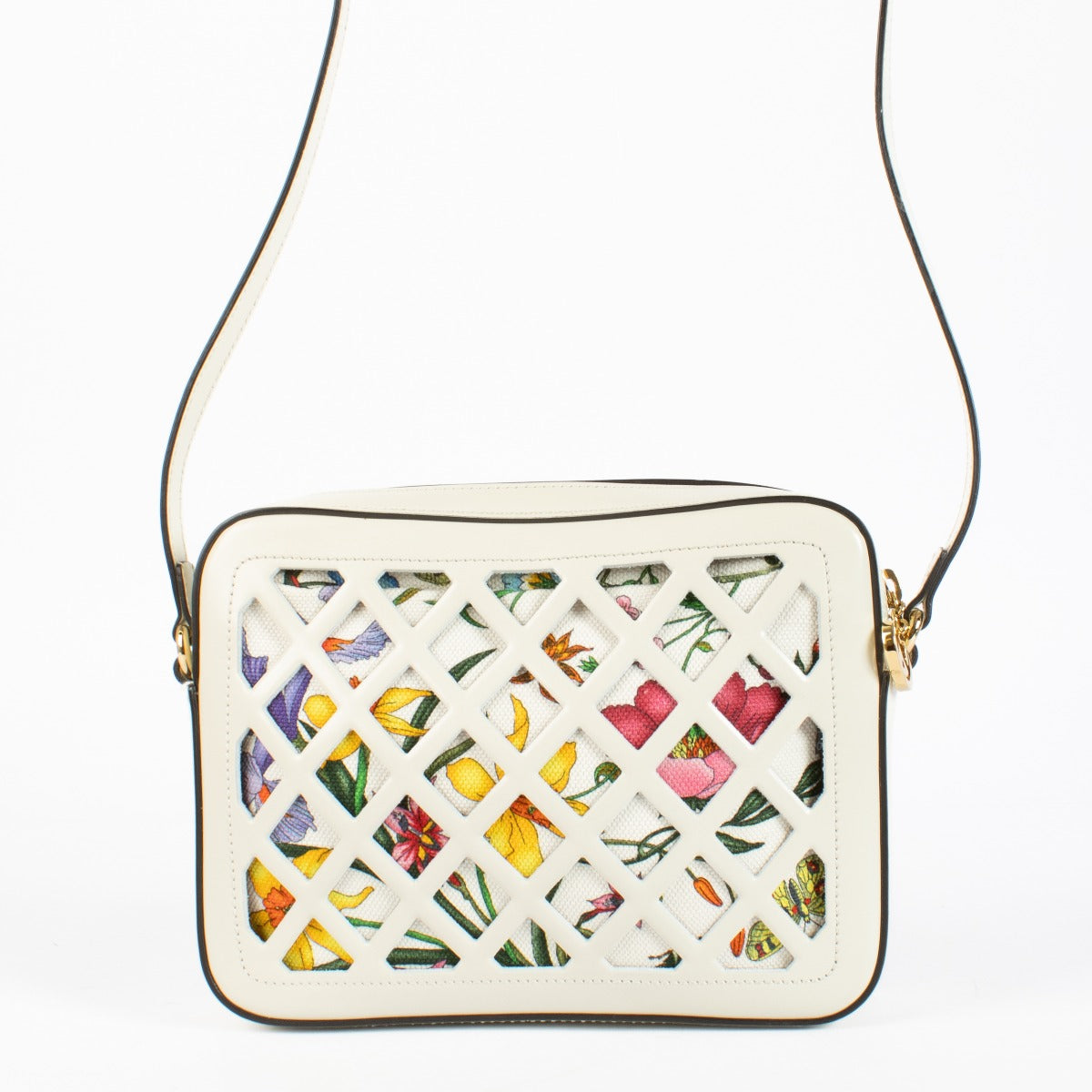 Authentic preloved Gucci White Cutout Leather Floral Canvas Bag on Labellov.com
