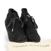 We buy and sell your authentic desginer Louis Vuitton Black Suede Wedge Booties