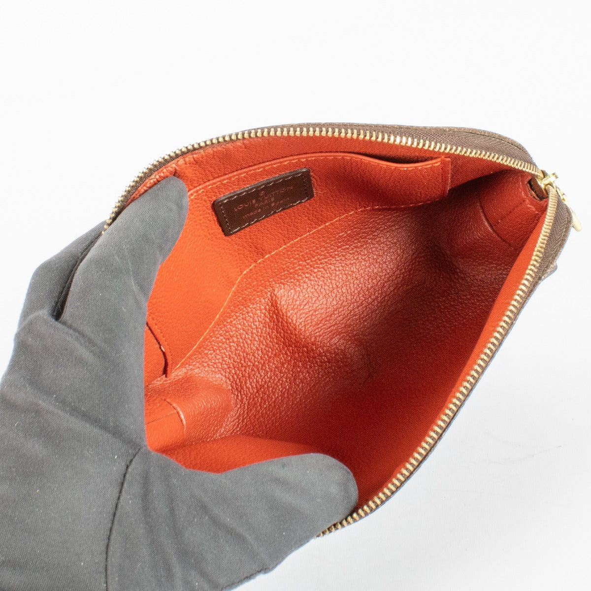 Authentic pre-loved Louis Vuitton Damier Ebene Cosmetic Pouch PM on Labellov.com