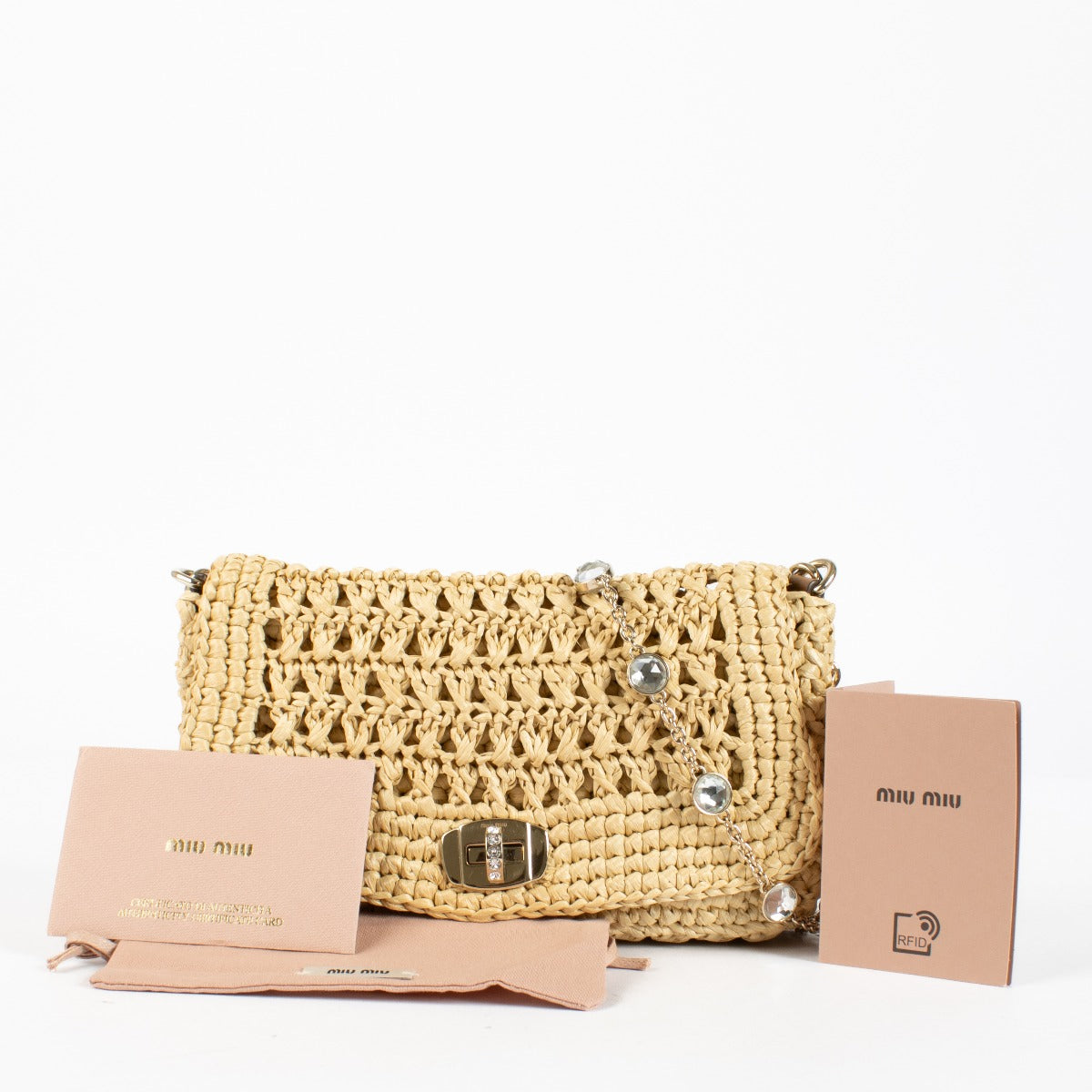 Authentic preloved Miu Miu Natural Raffia Bag on Labellov.com
