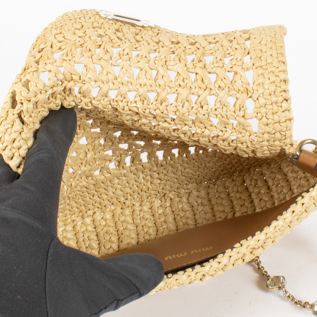 Authentic preloved Miu Miu Natural Raffia Bag on Labellov.com