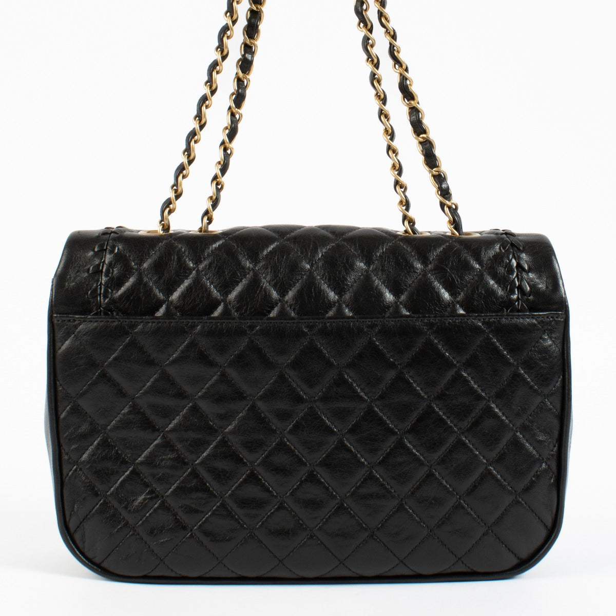Sac à rabat tressé Chanel en cuir de veau vieilli noir